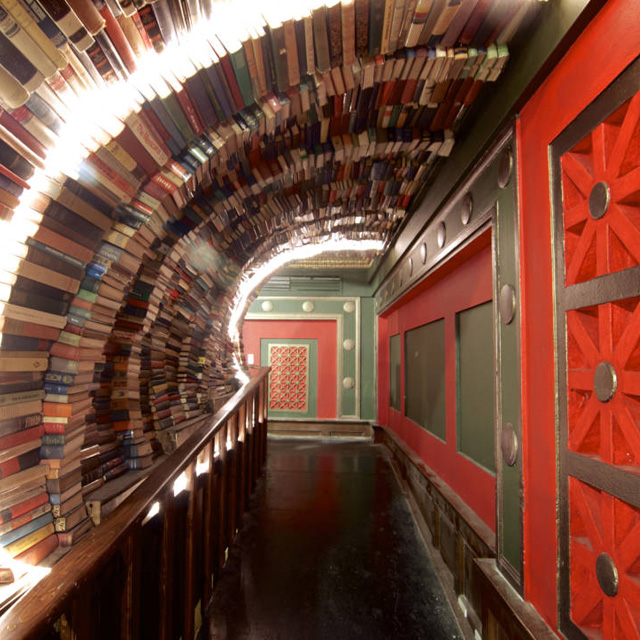 colorful hallway made of an arch of books