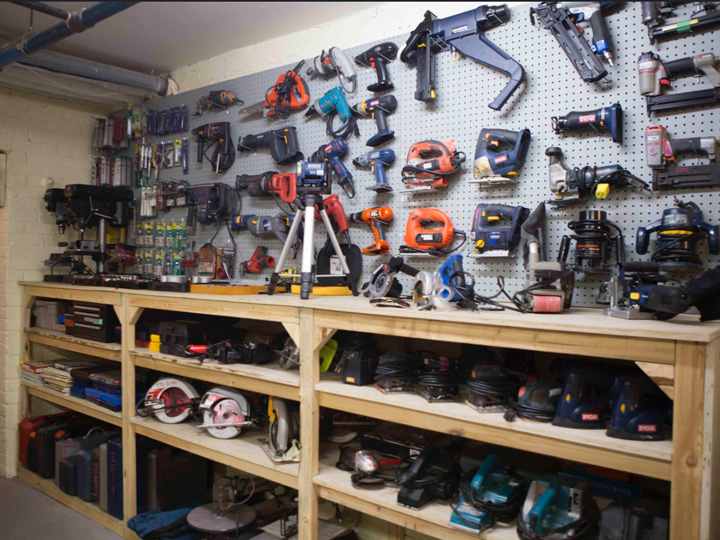 workbenches full of power tools