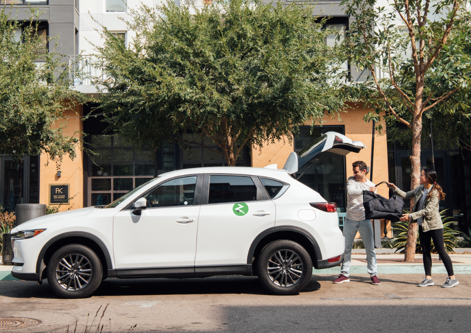 Couple using Ride Share in Apartment Complex 