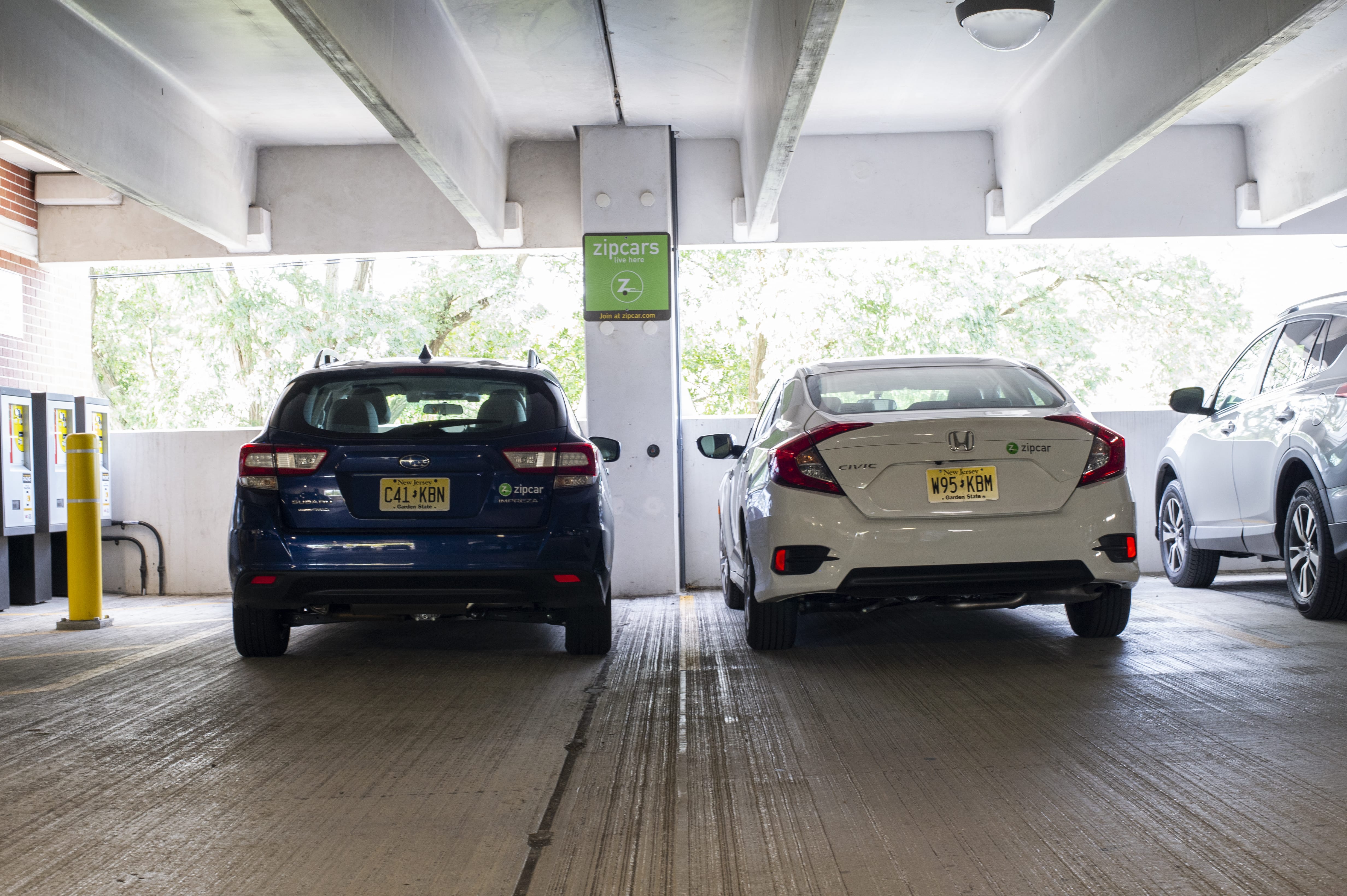 zipcars parked in spots 