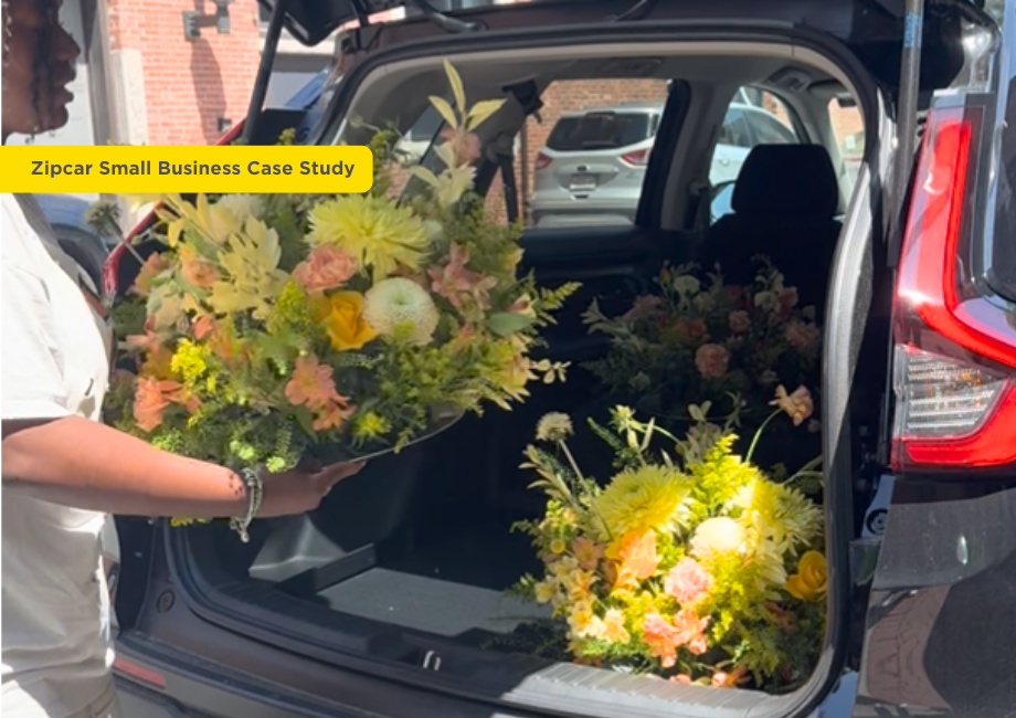 Woman placing flower arrangements in the trunk of a SUV