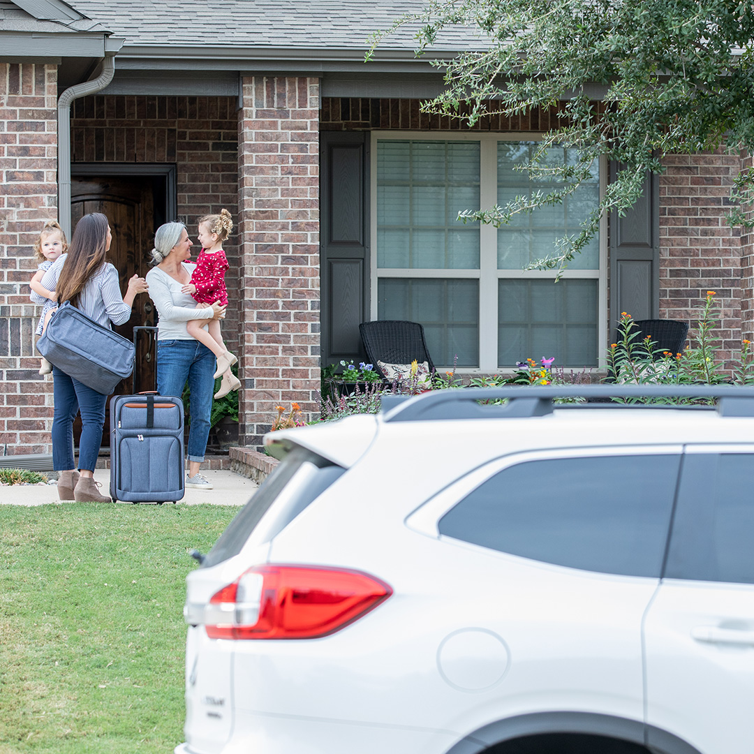 Family greeting after Thanksgiving travel with Zipcar