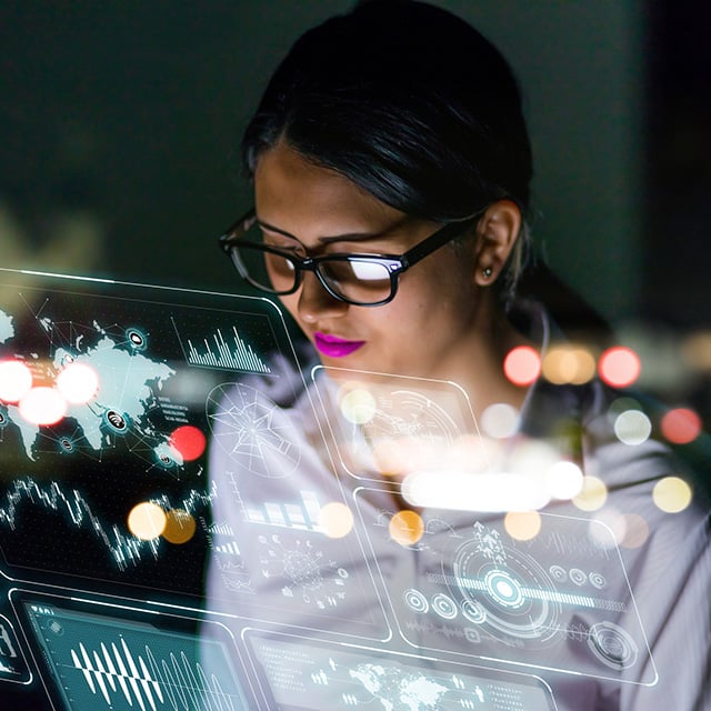 person looking at transparent computer screen