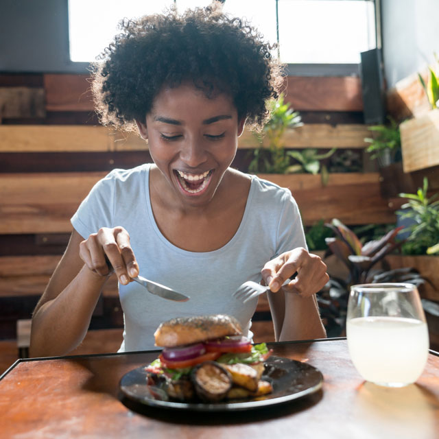 Woman eating a burger