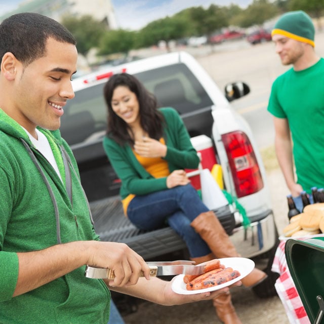 Three people tailgating