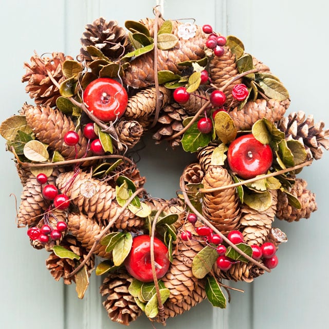 Fall wreath with apples and pine cones