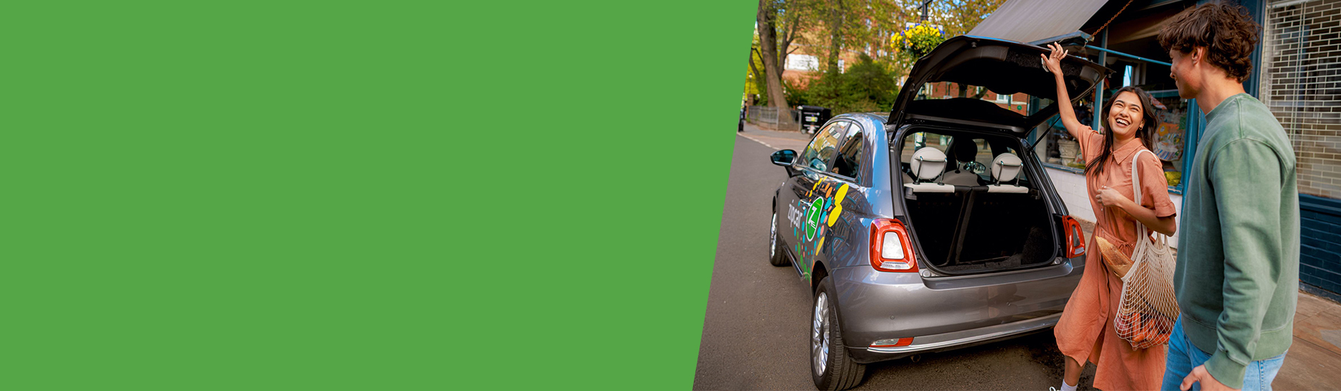 man renting a fiat 500 with Zipcar