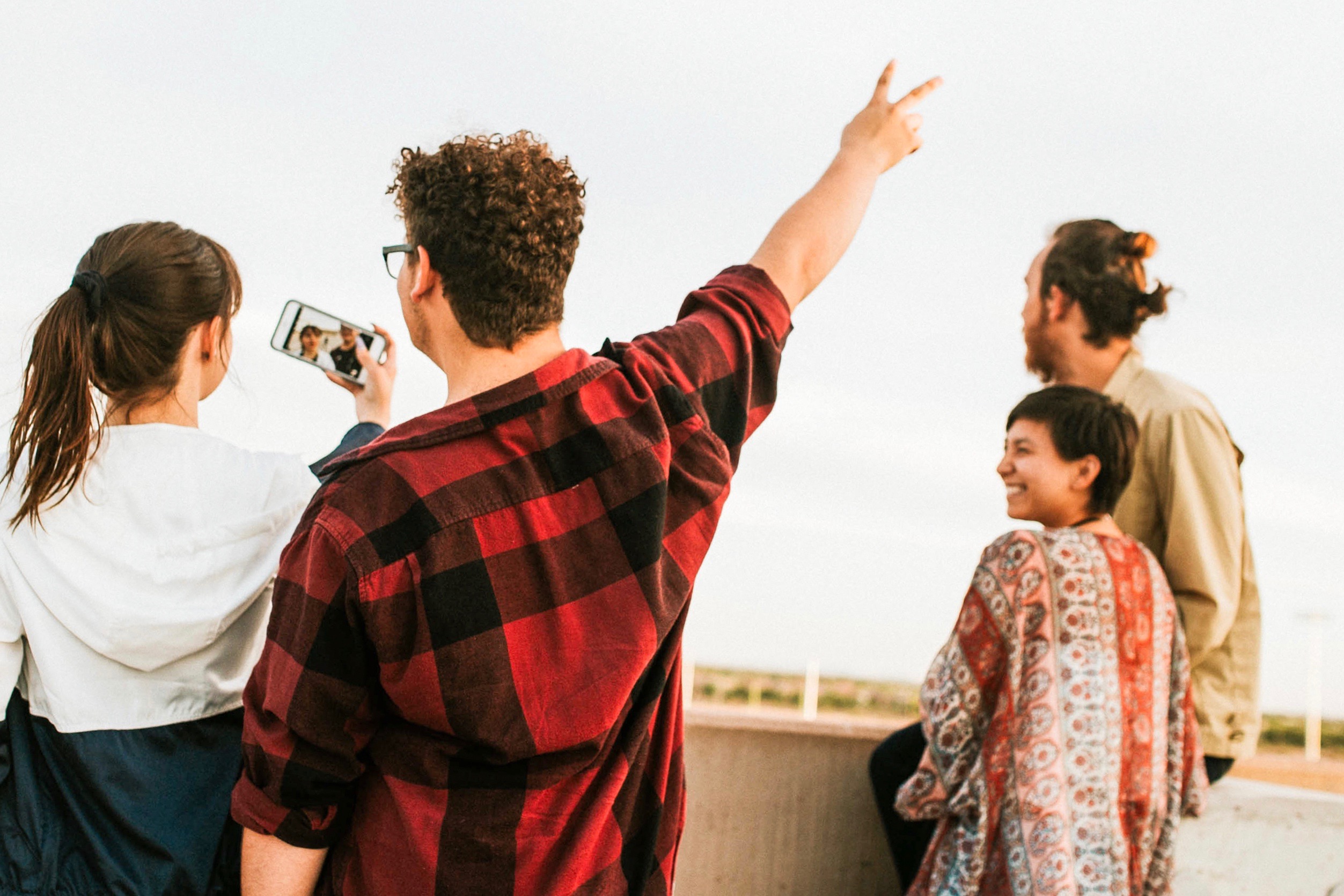 group of friends taking selfie 