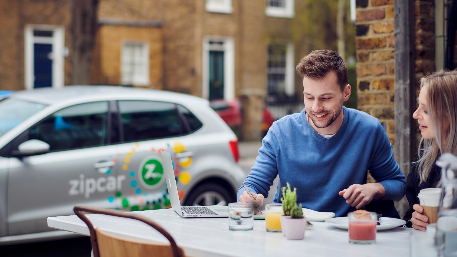 looking at a computer zipcar