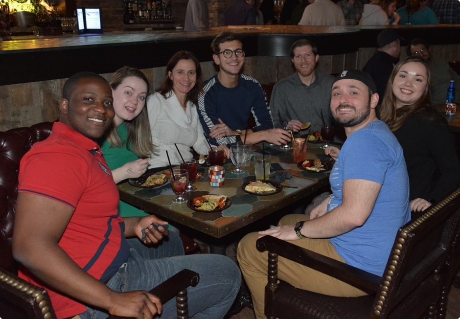 Group of people eating at a restaurant