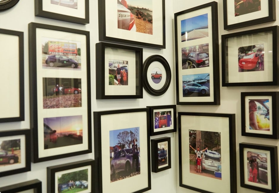 Corner wall full of framed photos