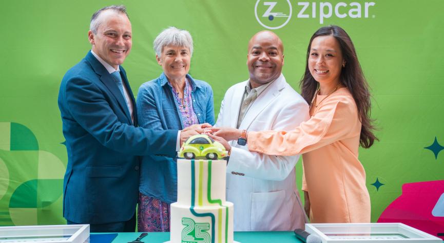Chairman Aaron Michlewitz, Robin Chase, Angelo Adams and Tiffany Chu cut the Zipcar 25th Anniversary cake
