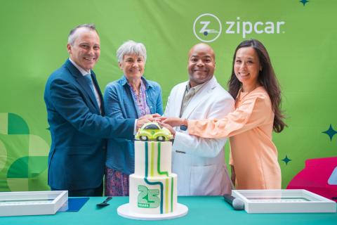 Chairman Aaron Michlewitz, Robin Chase, Angelo Adams and Tiffany Chu cut the Zipcar 25th Anniversary cake